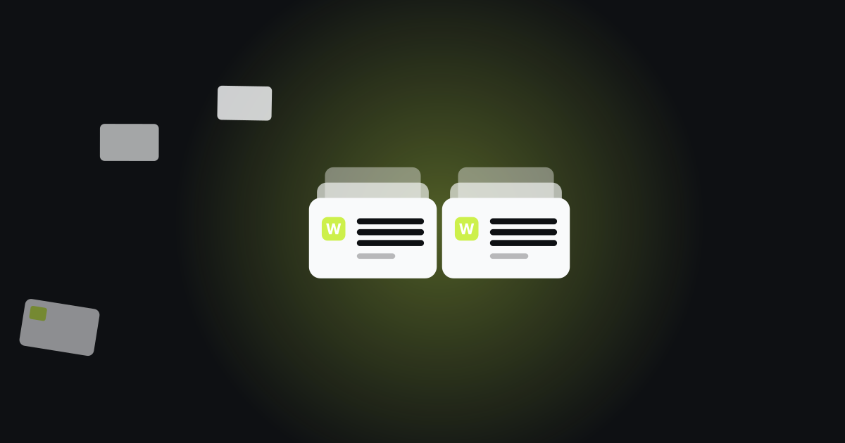 Two Wallyo card stacks side by side on a dark background, with scattered gift cards nearby